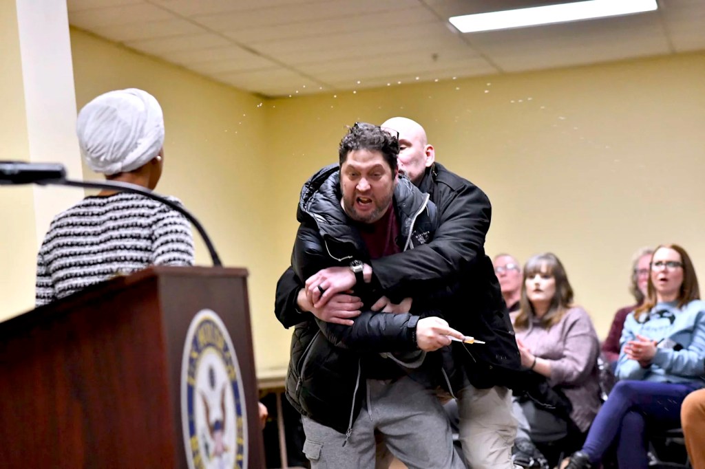Ilhan Omar Sprayed With Unknown Substance After Man Rushes Stage During Tense Minneapolis Town&nbsp;Hall